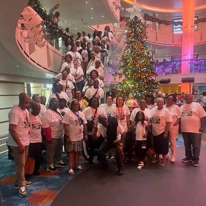 An S&S Travel group smiling together during a museum trip